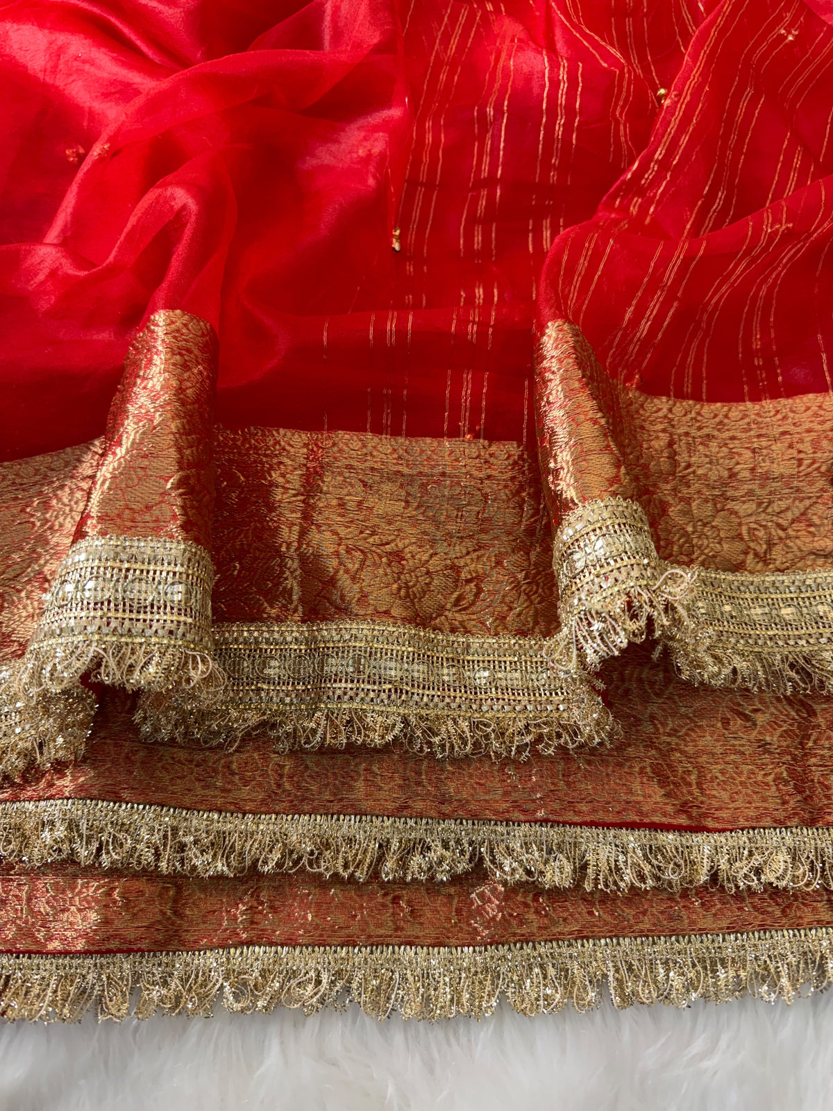 Premium Ghungroo Saree, crafted in luxurious pure tissue fabric