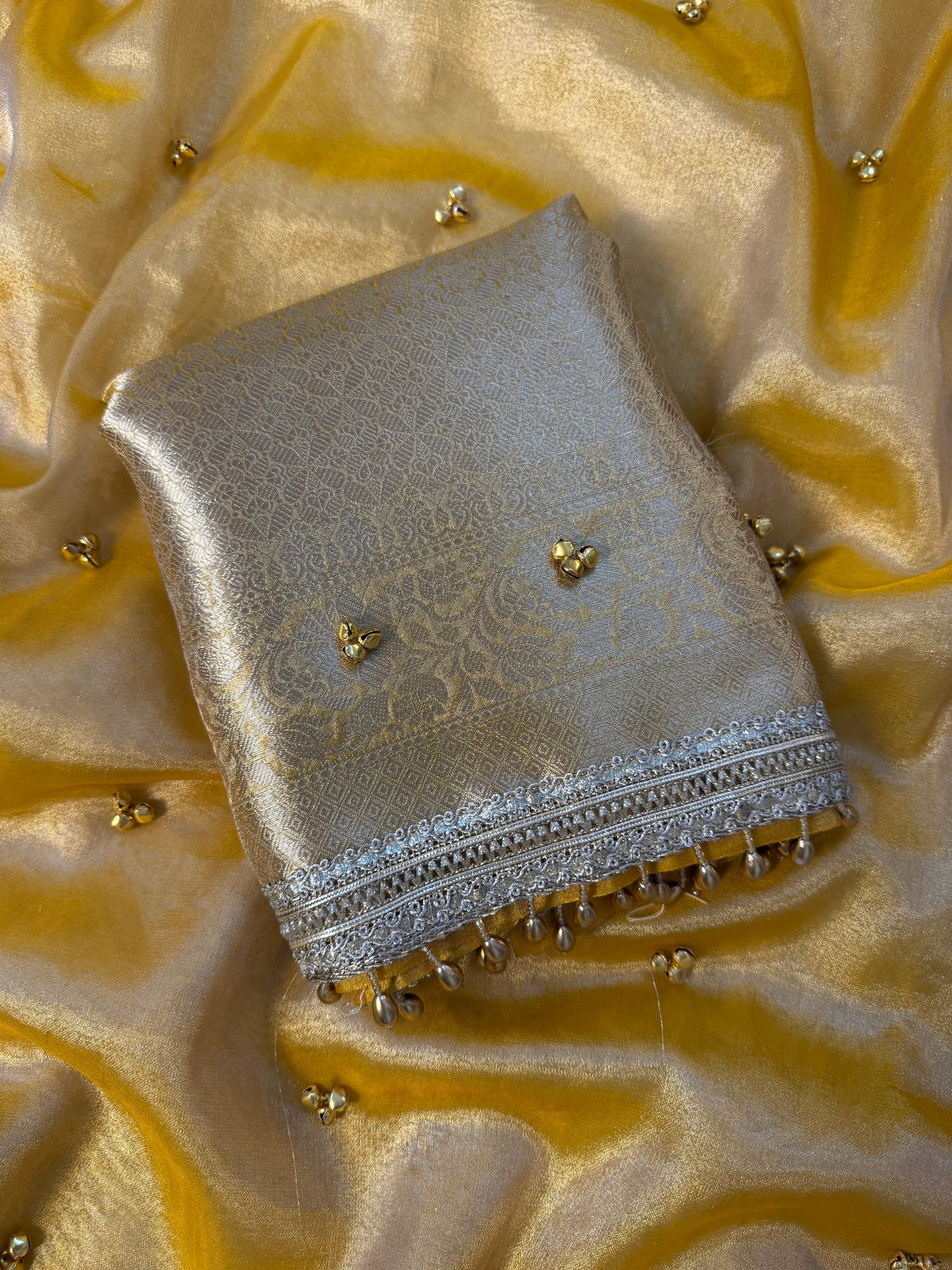 Beautiful tissue saree with Ghungroo work