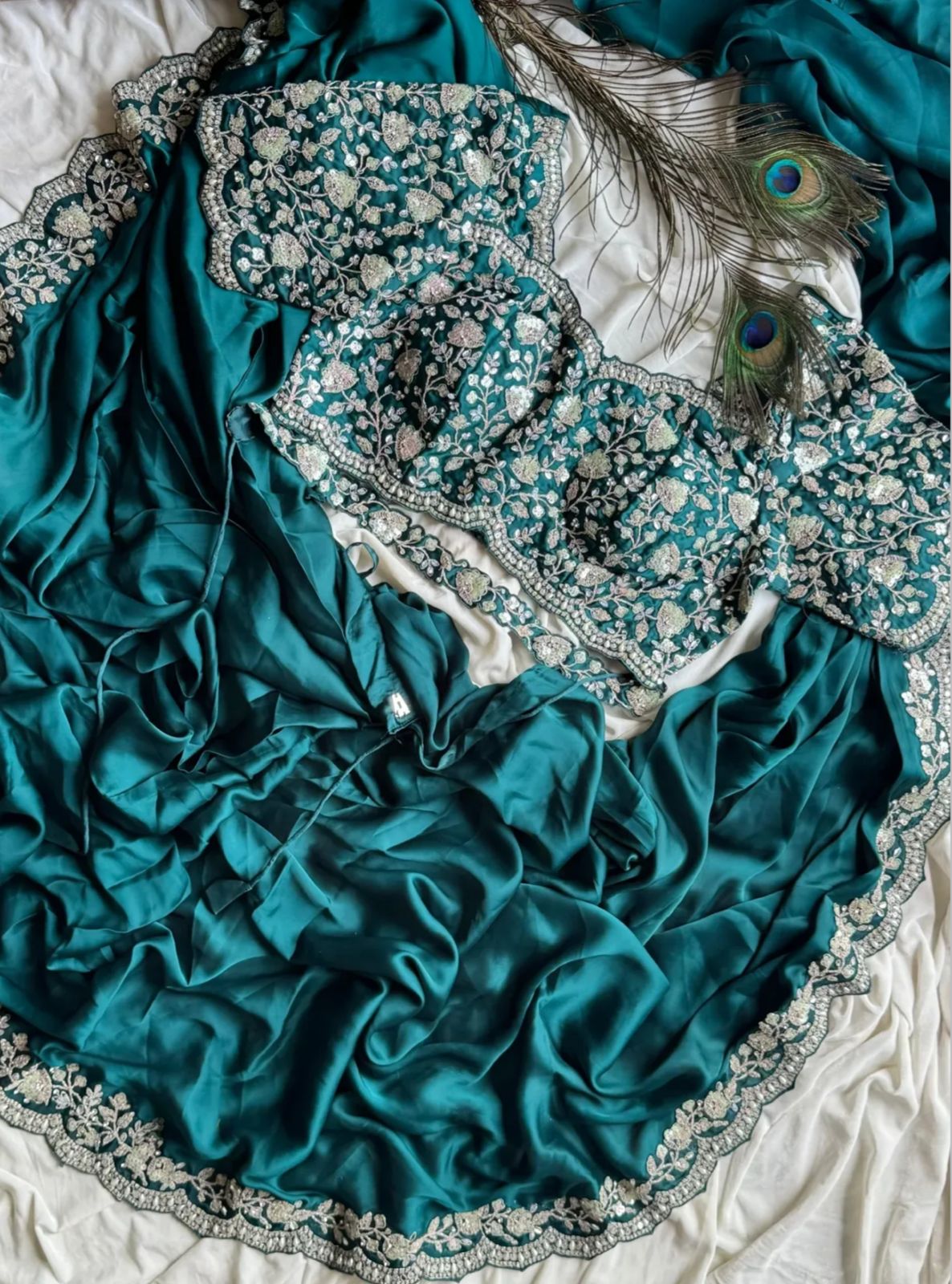 Ready-to-wear Pre-Drapped Saree with stitched designer Blouse.