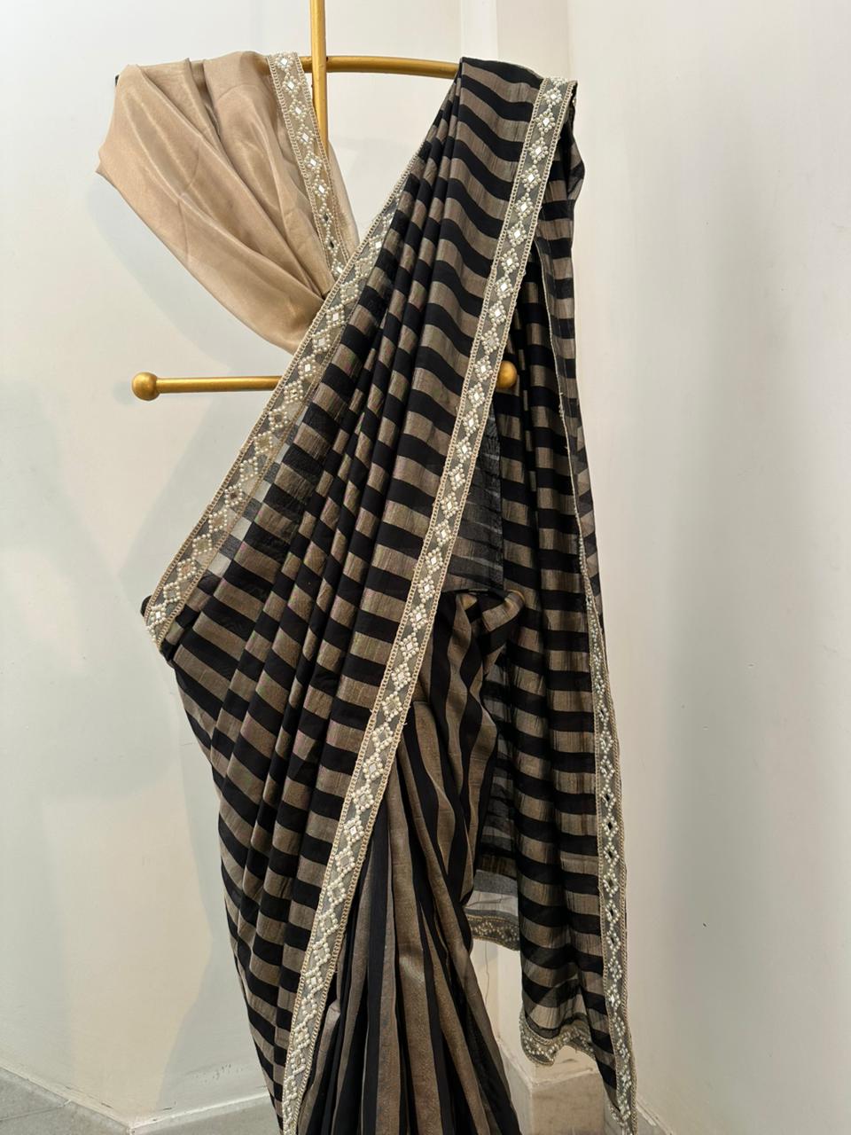Bridal tissue strips silk saree 
In aesthetic black colour