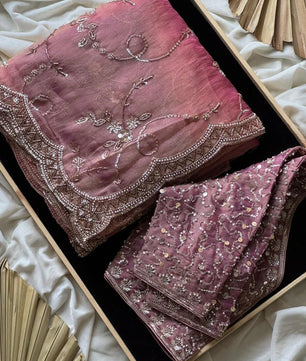 Soft organza crepe silk and adorned with heavy pearl sequence cutdana handwork