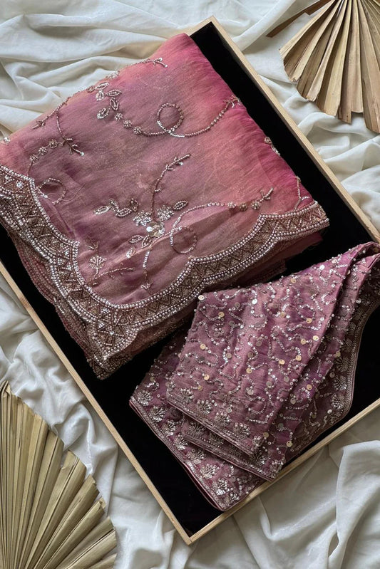 Soft organza crepe silk and adorned with heavy pearl sequence cutdana handwork