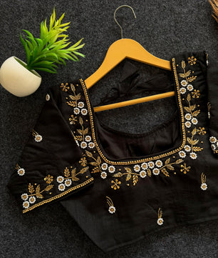Beautiful handwork all over front nd sleves with designer handwork in blouse