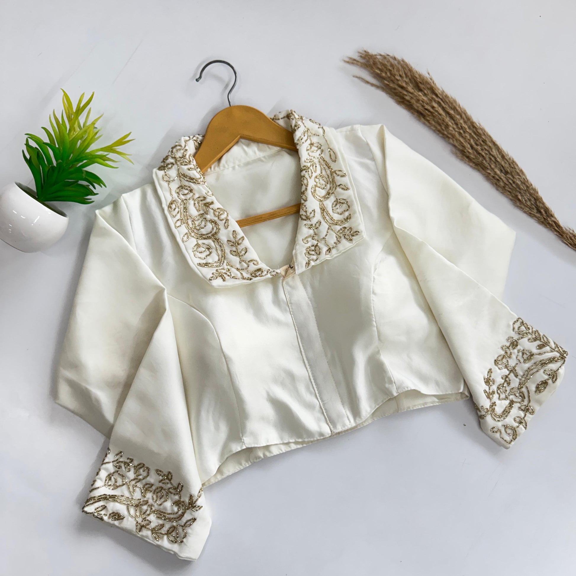 Beautiful handwork all over sleeve and collar in blouse