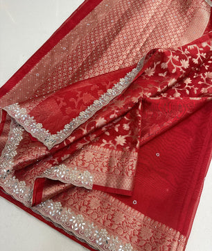 Presenting Banarasi Luxurious Shimmering Tissue Stone Work Saree