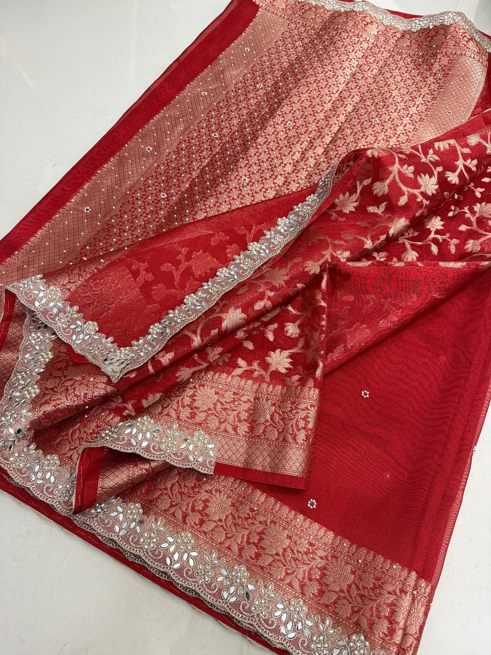 Presenting Banarasi Luxurious Shimmering Tissue Stone Work Saree