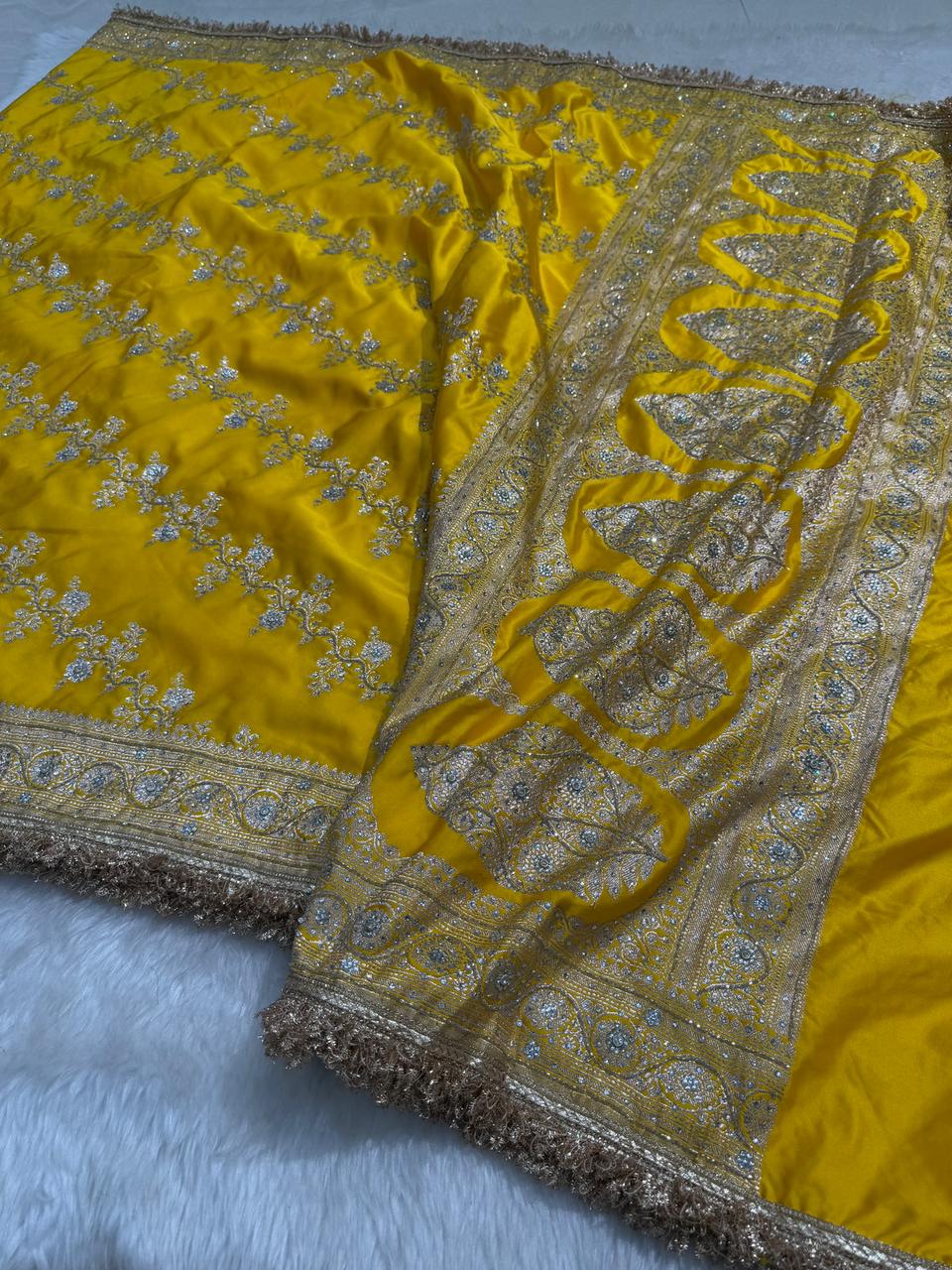 Banarasi Soft Mashru Katan Silk in Marigold Yellow.
Handwoven buta motifs