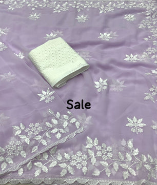 Light color georgette saree with white thread c-pallu.