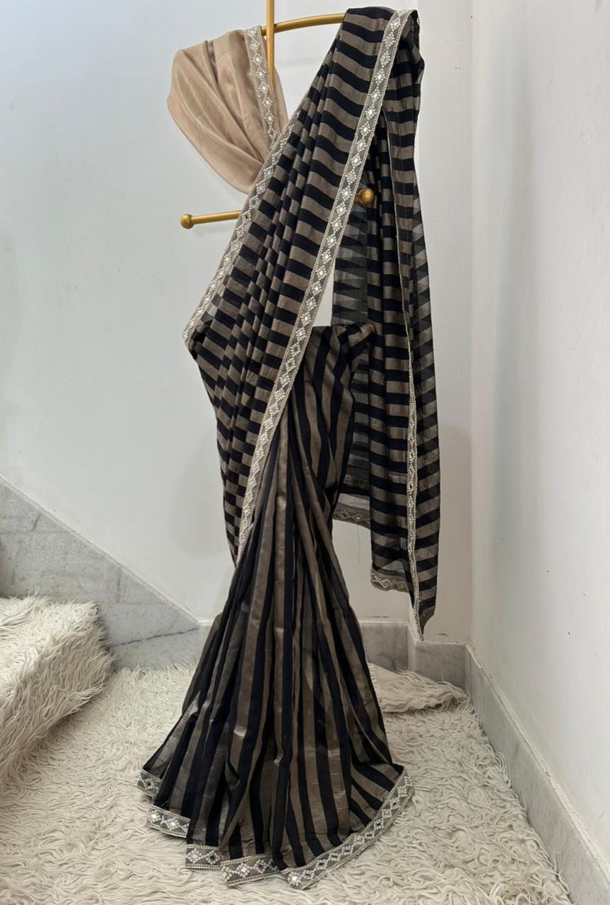 Bridal tissue strips silk saree 
In aesthetic black colour