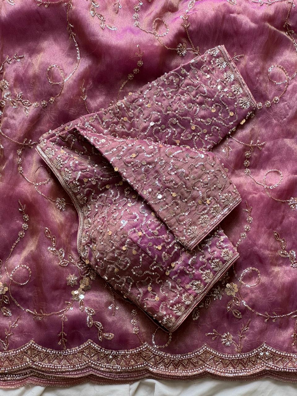 Soft organza crepe silk and adorned with heavy pearl sequence cutdana handwork