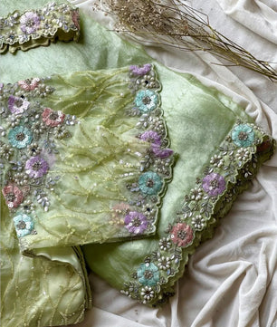 Ready-to-wear Pre-Drapped Saree with stitched designer Blouse.