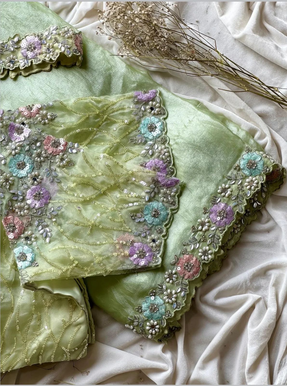 Ready-to-wear Pre-Drapped Saree with stitched designer Blouse.