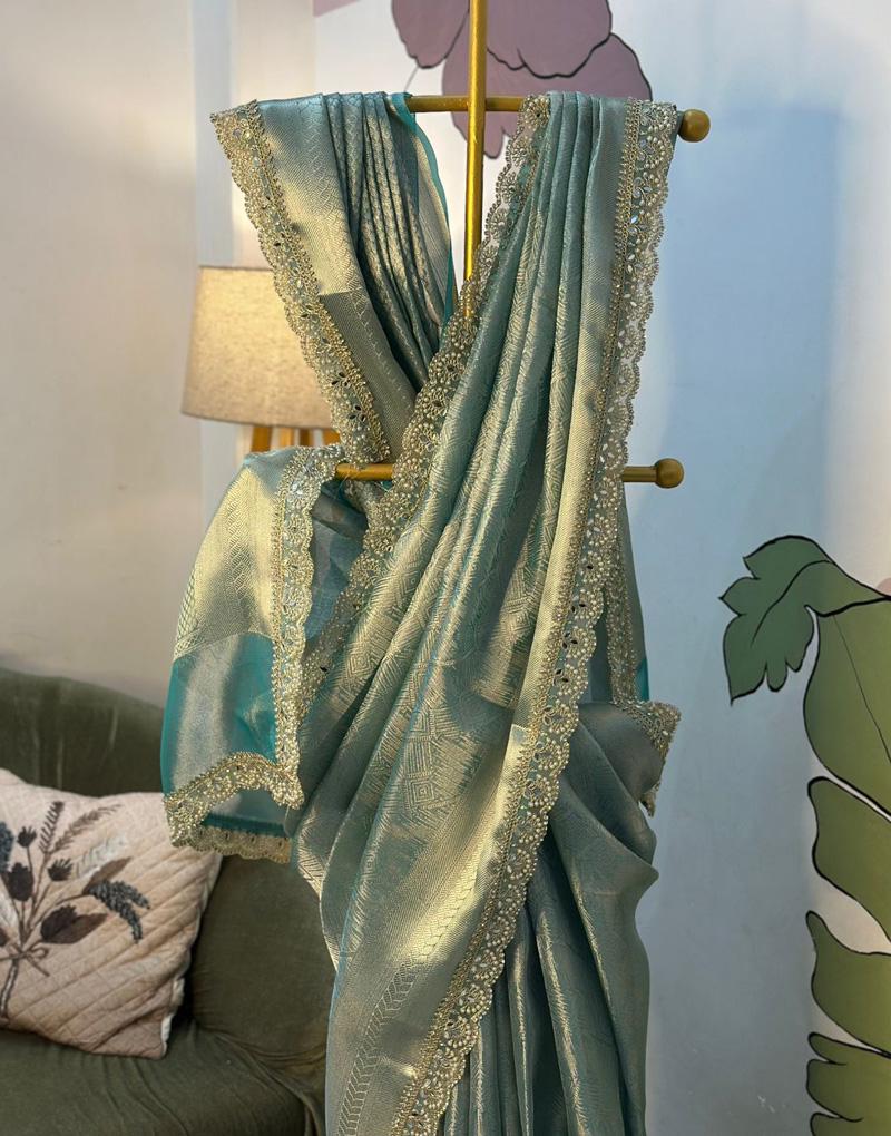 Exude elegance in this exquisite designer Kanjeevaram brocade tissue silk saree