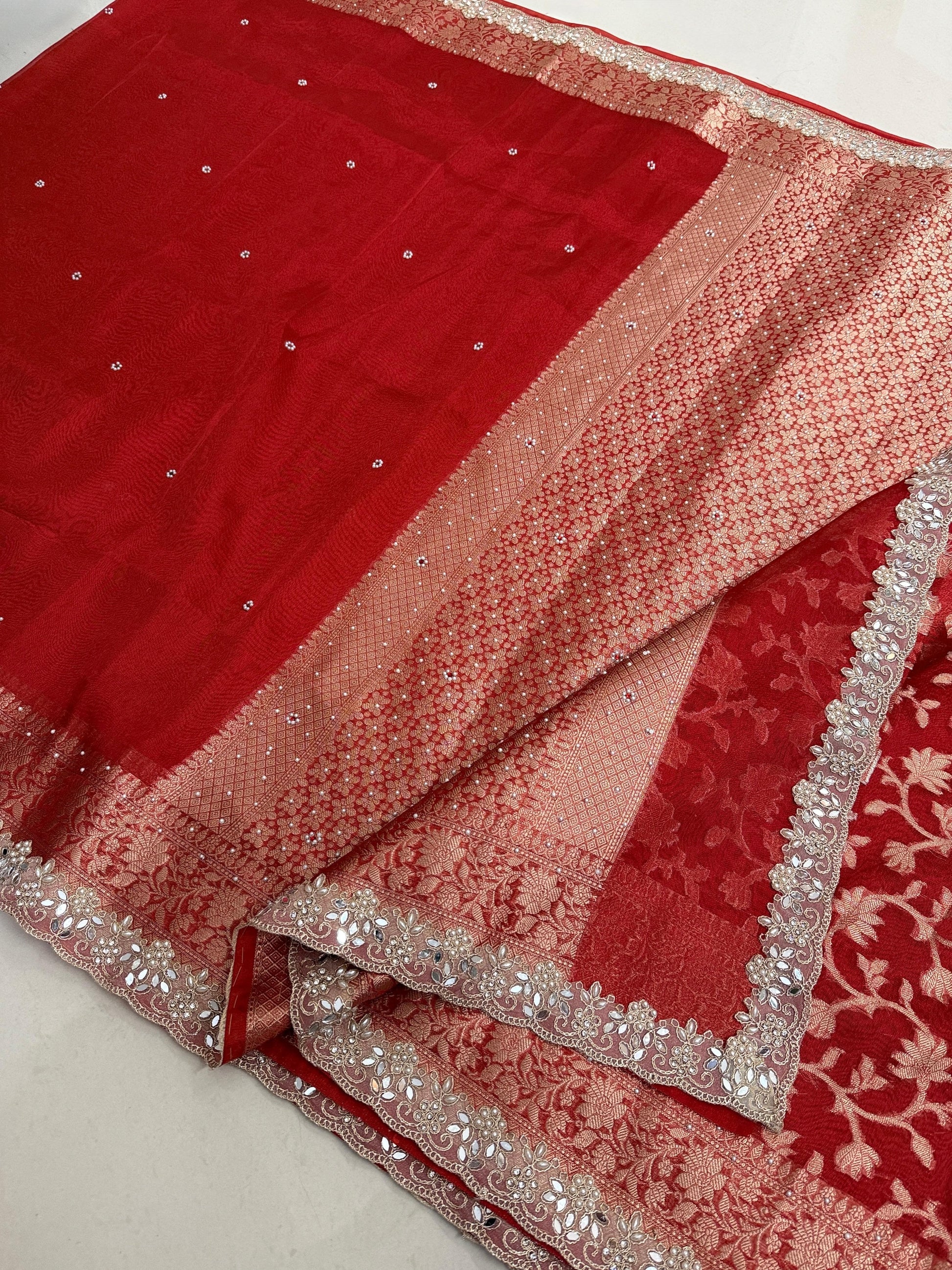 Presenting Banarasi Luxurious Shimmering Tissue Stone Work Saree