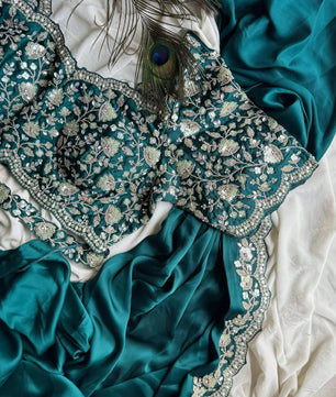 Ready-to-wear Pre-Drapped Saree with stitched designer Blouse.