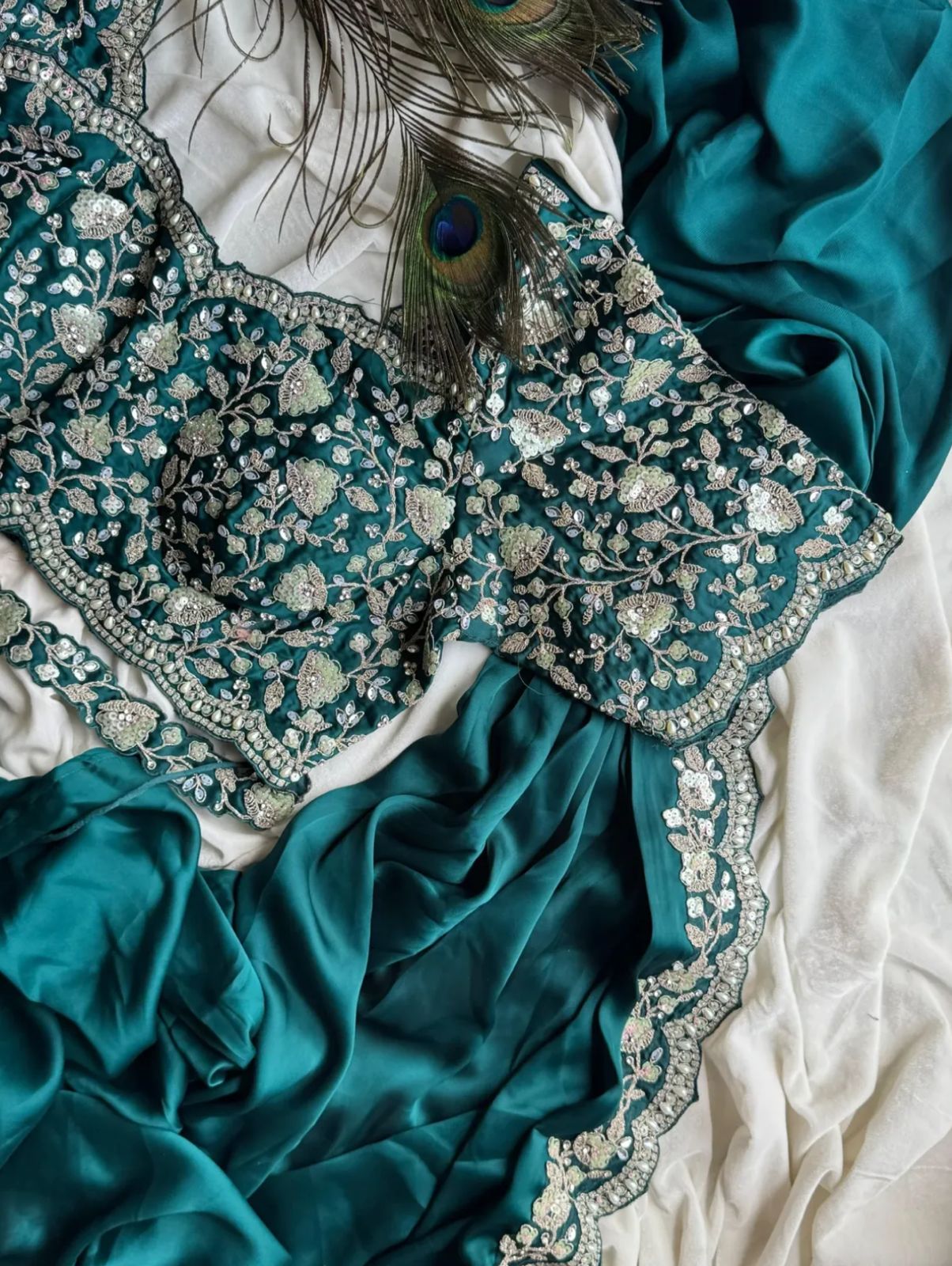 Ready-to-wear Pre-Drapped Saree with stitched designer Blouse.