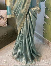 Exude elegance in this exquisite designer Kanjeevaram brocade tissue silk saree