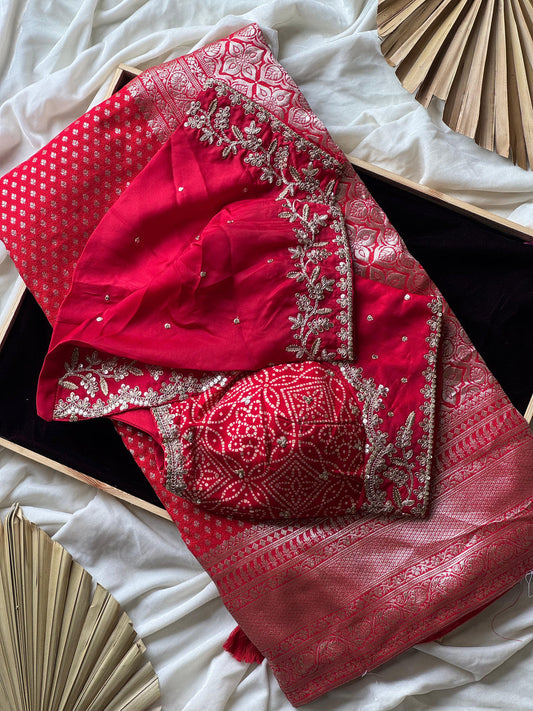 Banarasi Silk Saree Teamed With Red Bandhej Stiched Blouse