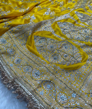 Banarasi Soft Mashru Katan Silk in Marigold Yellow.
Handwoven buta motifs