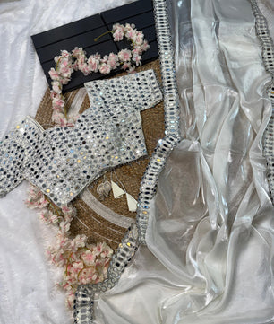 Satin Organza saree which is embedded with real mirror work Embroidery all