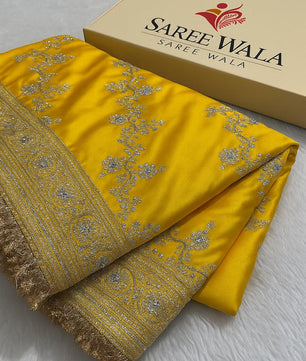 Banarasi Soft Mashru Katan Silk in Marigold Yellow.
Handwoven buta motifs