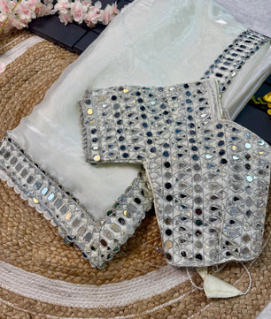 Satin Organza saree which is embedded with real mirror work Embroidery all