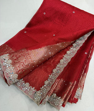 Presenting Banarasi Luxurious Shimmering Tissue Stone Work Saree