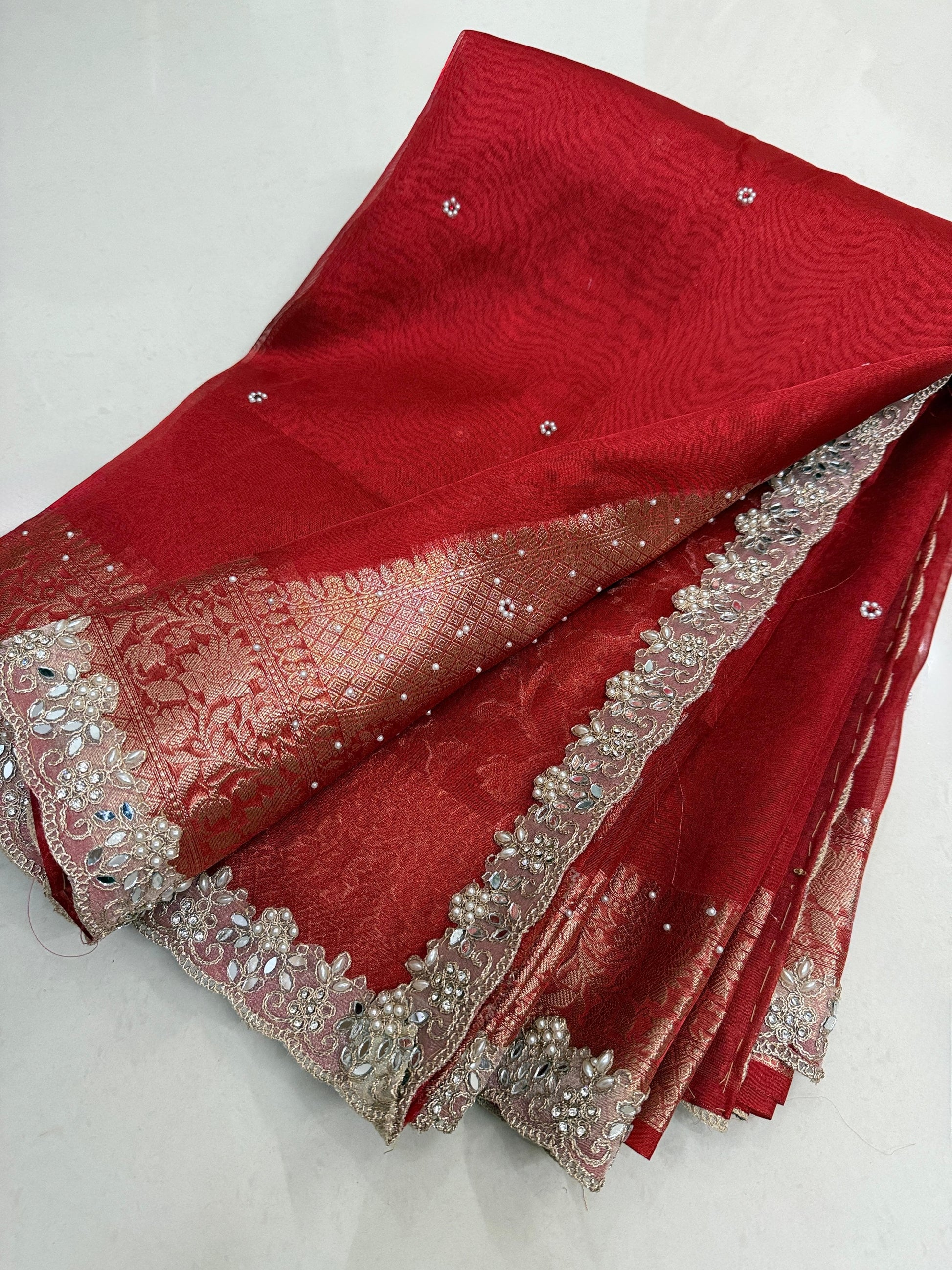 Presenting Banarasi Luxurious Shimmering Tissue Stone Work Saree