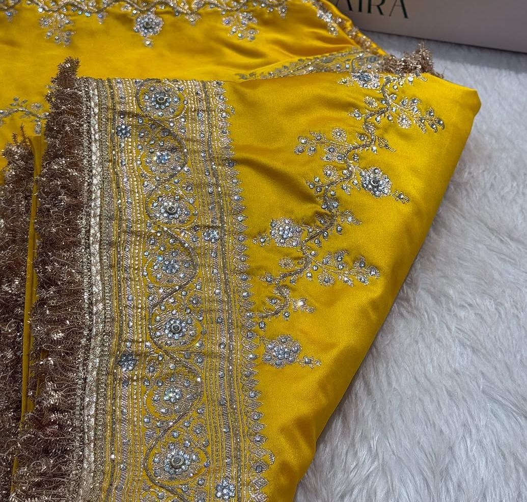Banarasi Soft Mashru Katan Silk in Marigold Yellow.
Handwoven buta motifs
