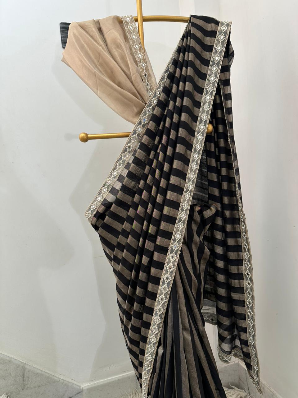 Bridal tissue strips silk saree 
In aesthetic black colour