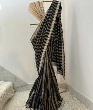 Bridal tissue strips silk saree 
In aesthetic black colour
