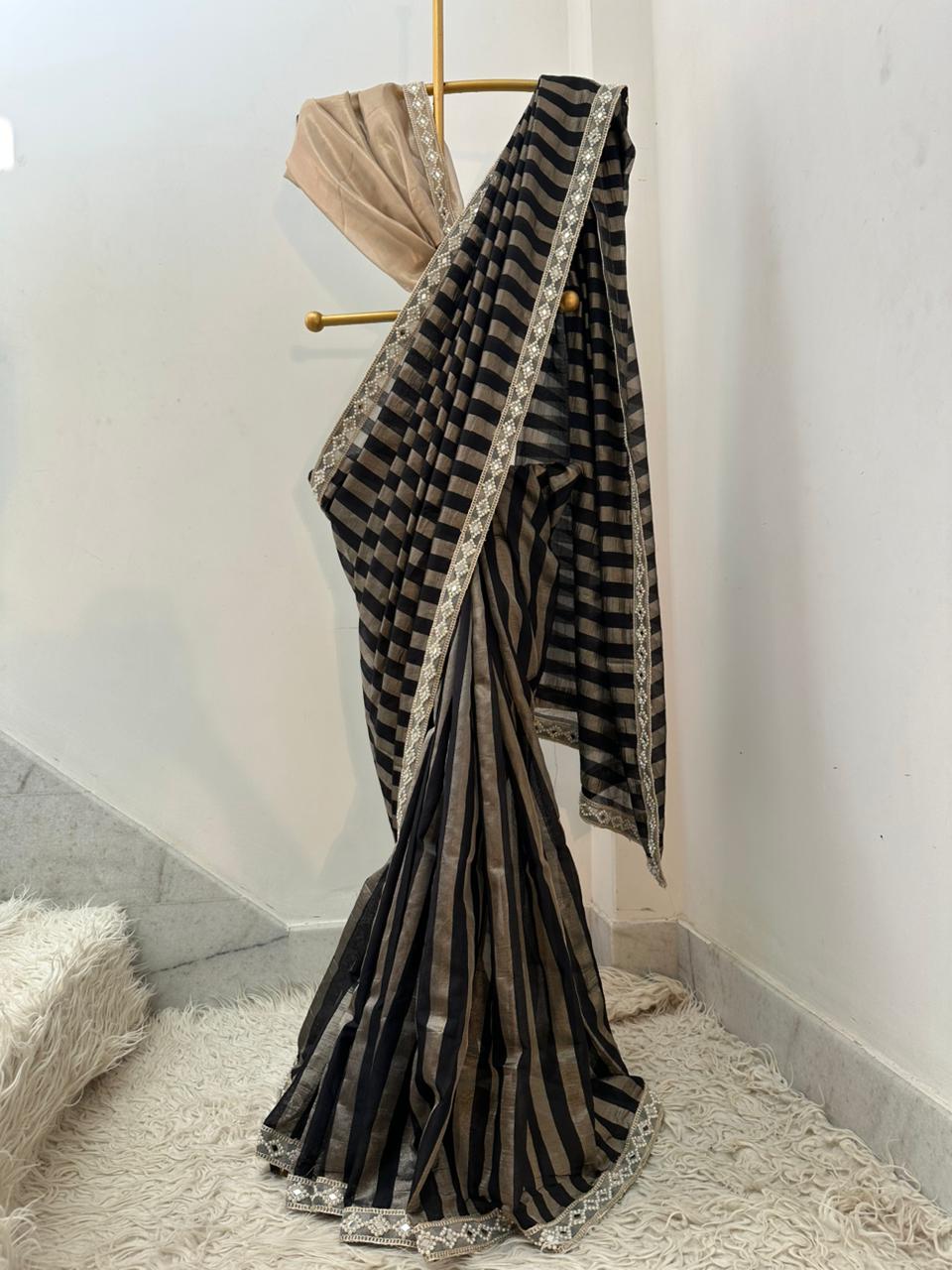 Bridal tissue strips silk saree 
In aesthetic black colour