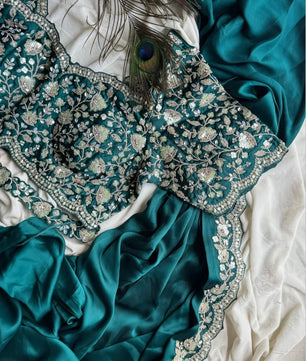 Ready-to-wear Pre-Drapped Saree with stitched designer Blouse.