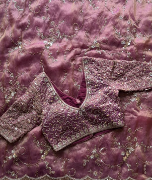 Soft organza crepe silk and adorned with heavy pearl sequence cutdana handwork