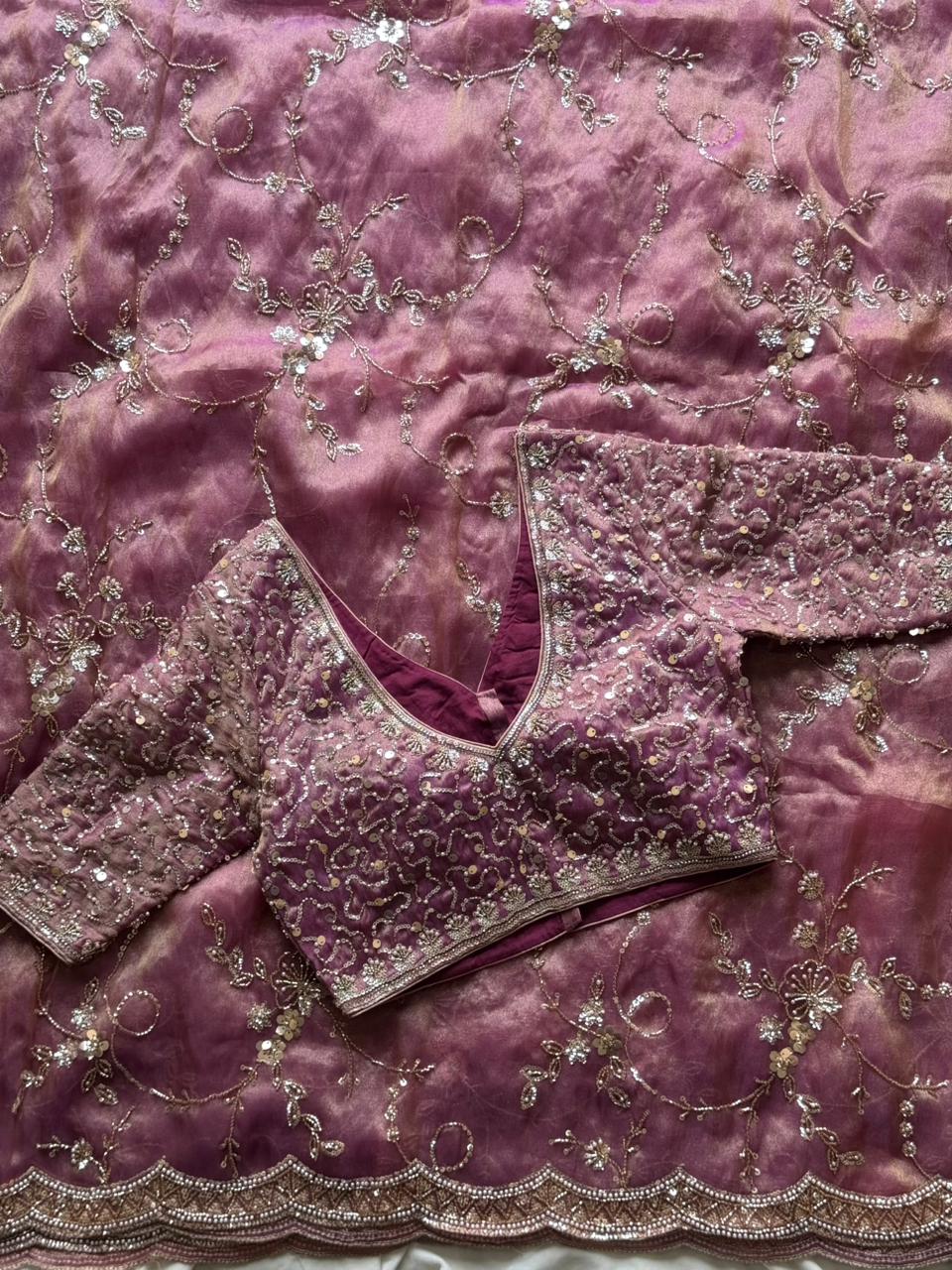 Soft organza crepe silk and adorned with heavy pearl sequence cutdana handwork