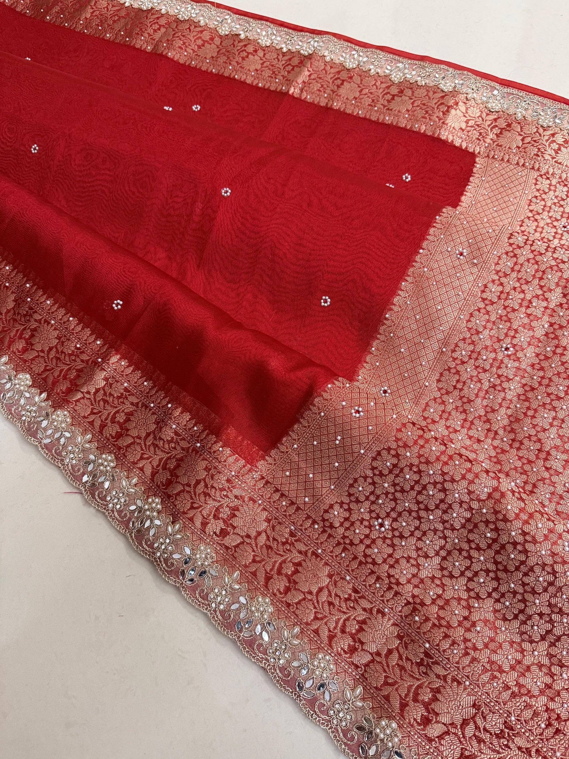 Presenting Banarasi Luxurious Shimmering Tissue Stone Work Saree