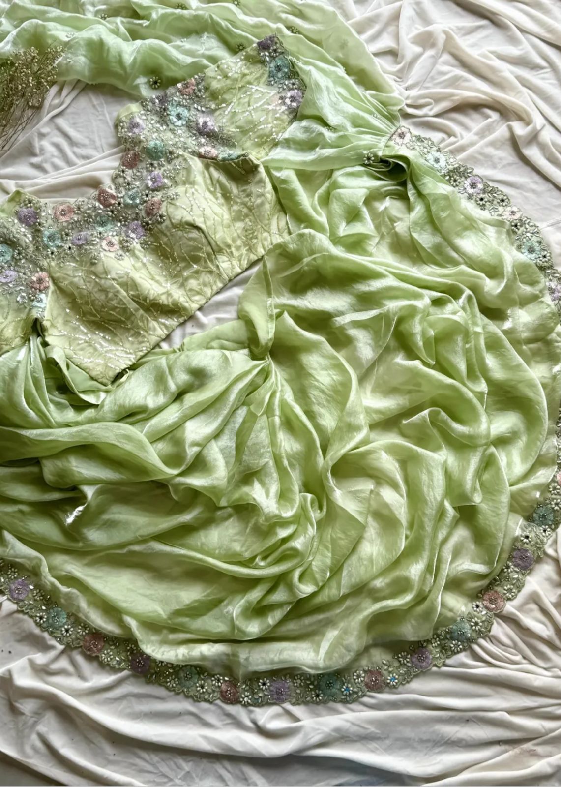 Ready-to-wear Pre-Drapped Saree with stitched designer Blouse.