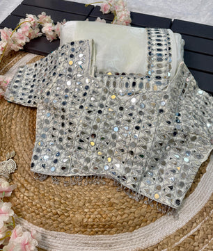 Satin Organza saree which is embedded with real mirror work Embroidery all