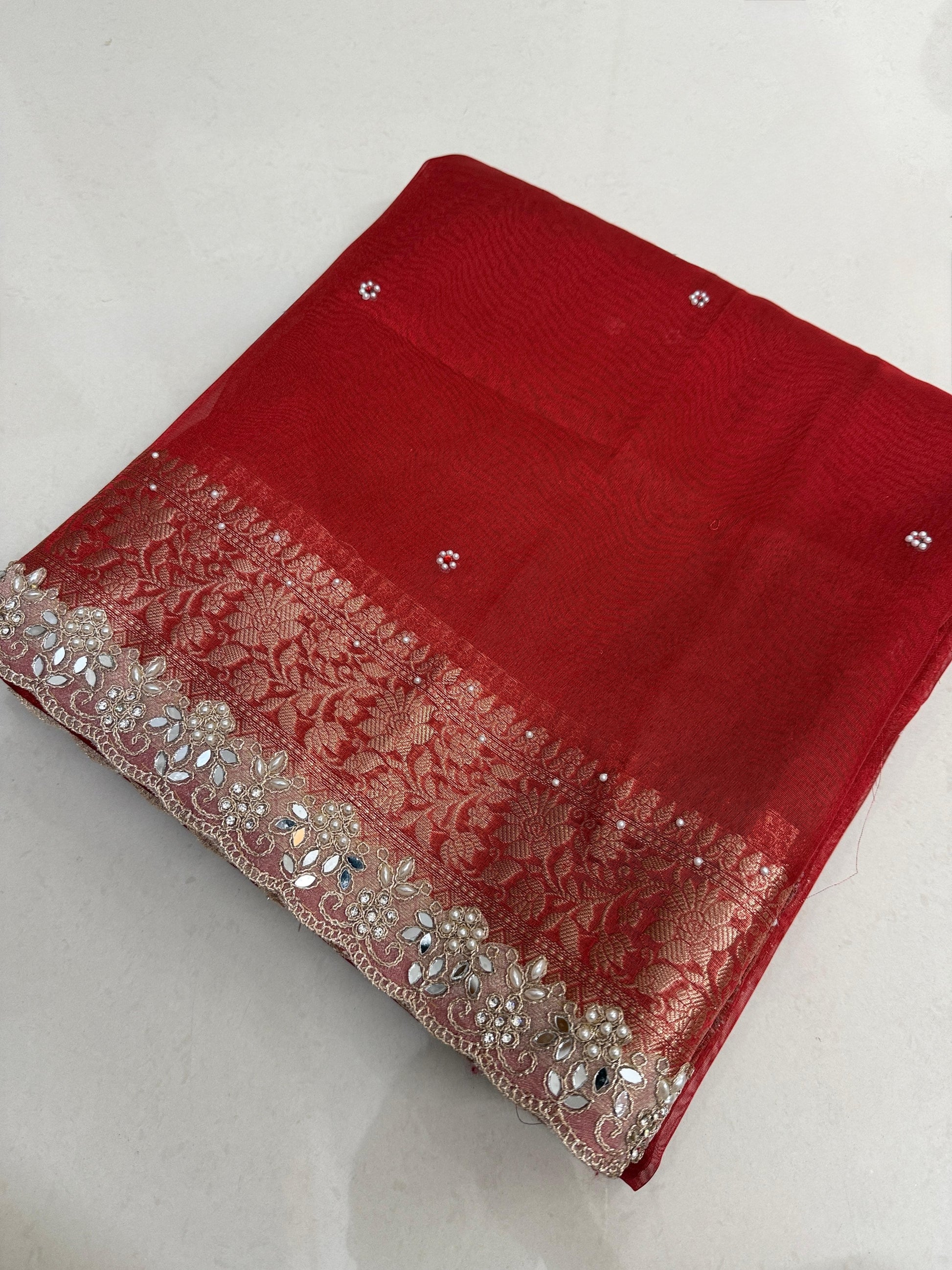 Presenting Banarasi Luxurious Shimmering Tissue Stone Work Saree