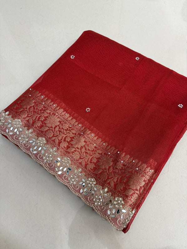 Presenting Banarasi Luxurious Shimmering Tissue Stone Work Saree