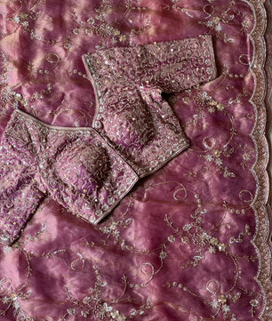 Soft organza crepe silk and adorned with heavy pearl sequence cutdana handwork