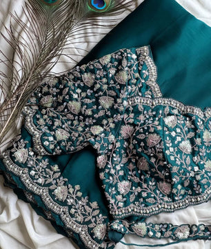 Ready-to-wear Pre-Drapped Saree with stitched designer Blouse.