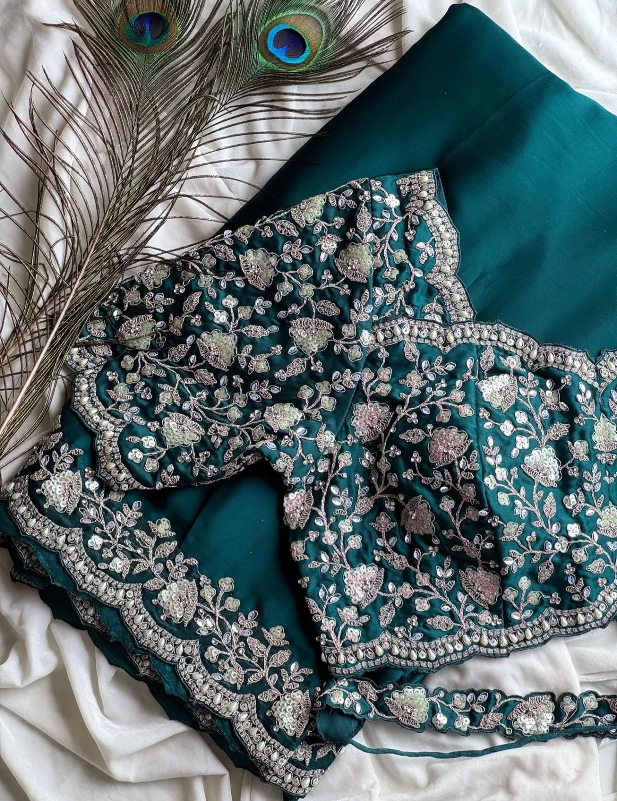 Ready-to-wear Pre-Drapped Saree with stitched designer Blouse.