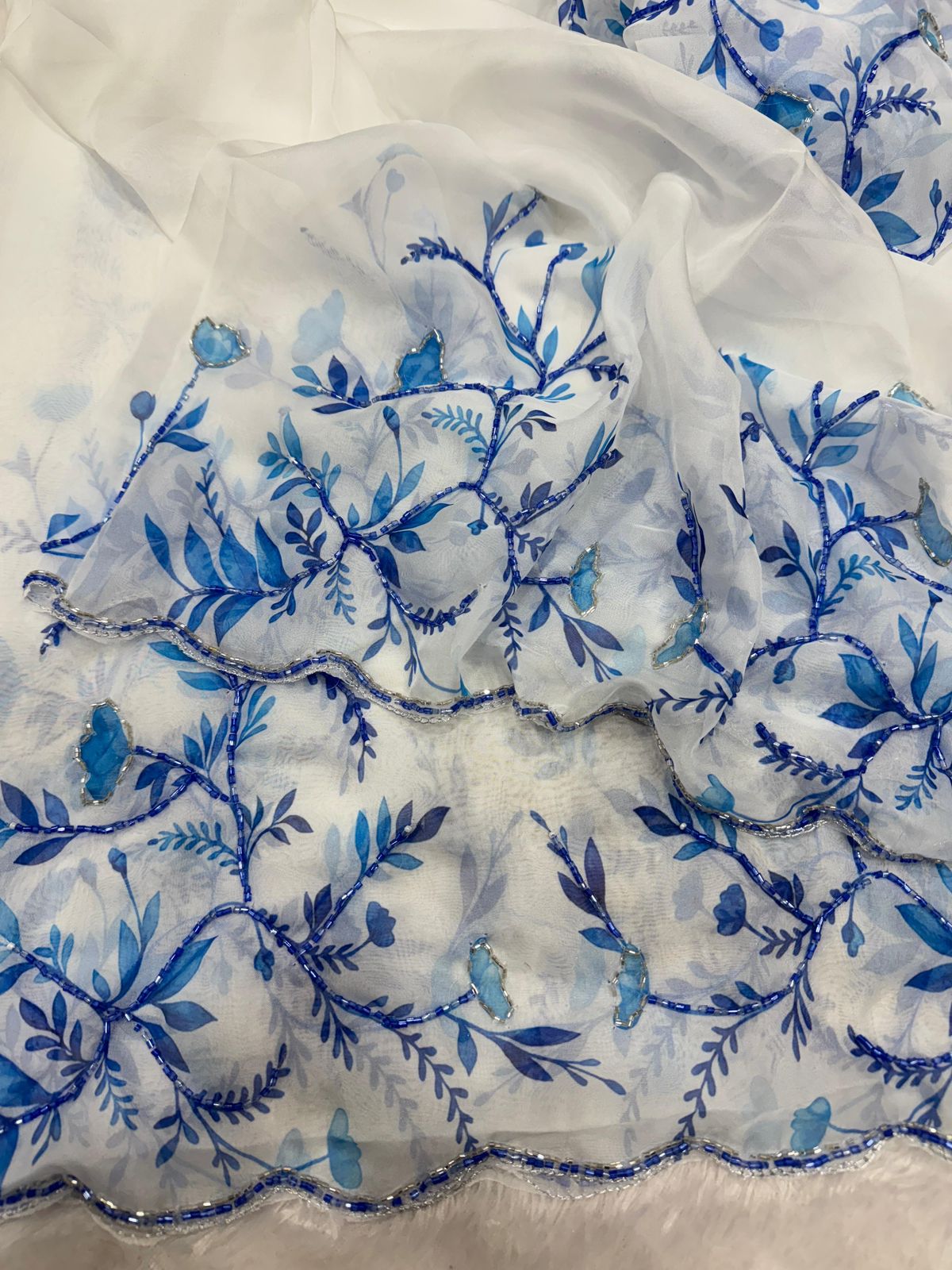 Present a new trending floral handwork saree collection
