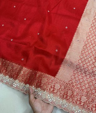 Presenting Banarasi Luxurious Shimmering Tissue Stone Work Saree