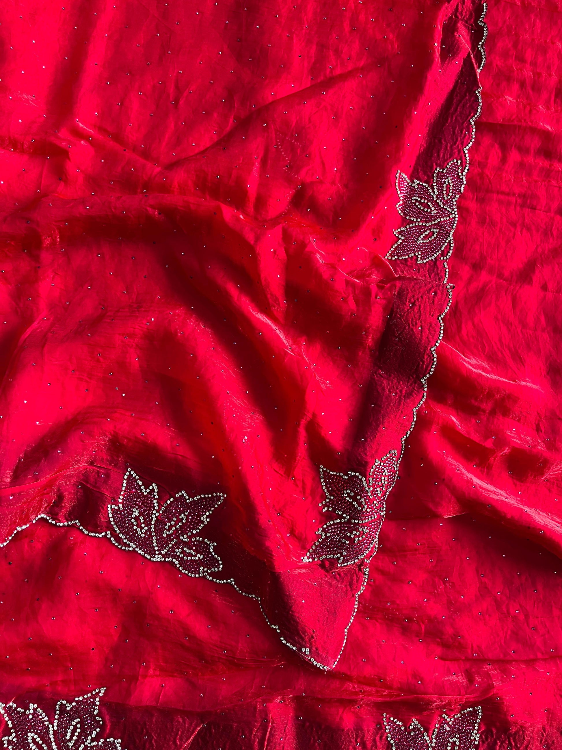 Blooming Fox Georgette saree with dual tone diamonds on all over the saree