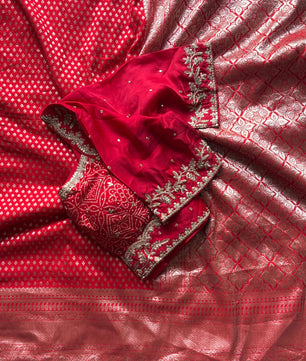 Banarasi Silk Saree Teamed With Red Bandhej Stiched Blouse