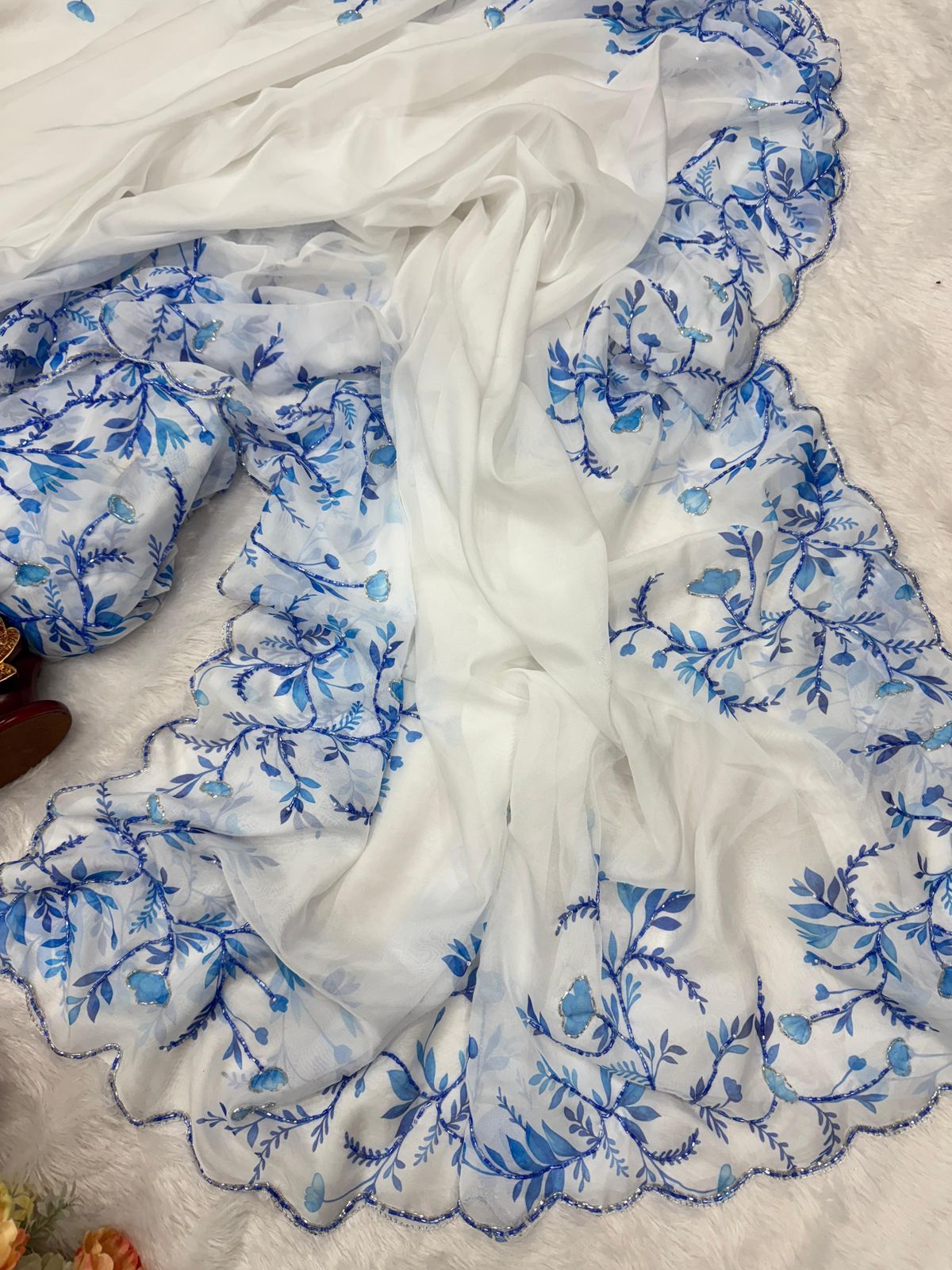 Present a new trending floral handwork saree collection