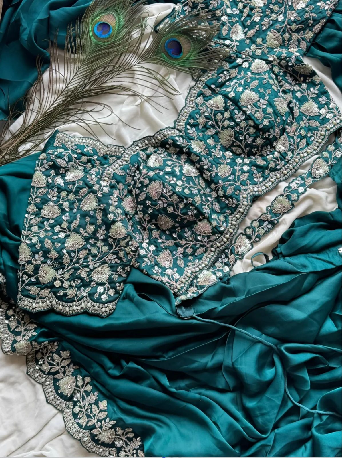 Ready-to-wear Pre-Drapped Saree with stitched designer Blouse.