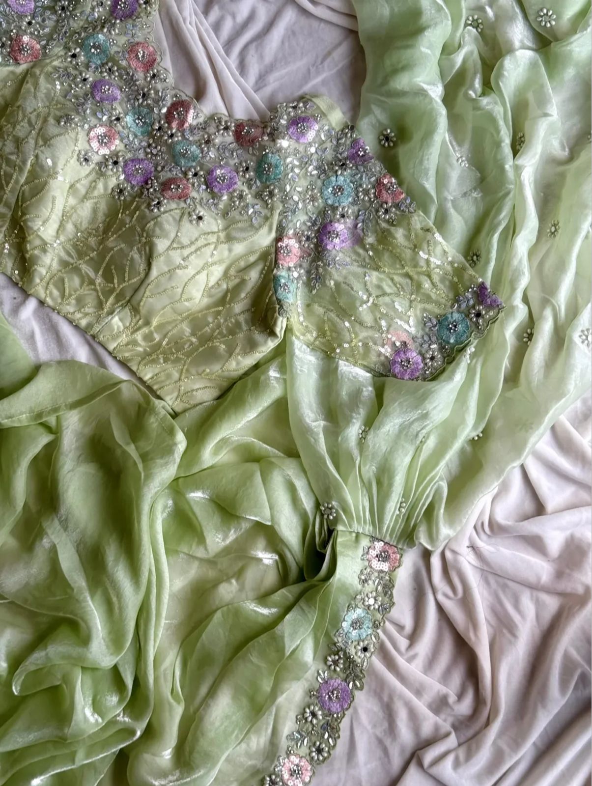 Ready-to-wear Pre-Drapped Saree with stitched designer Blouse.